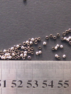 Стопер метал топче 2 мм дупка 1 мм цвят сребро -200 броя